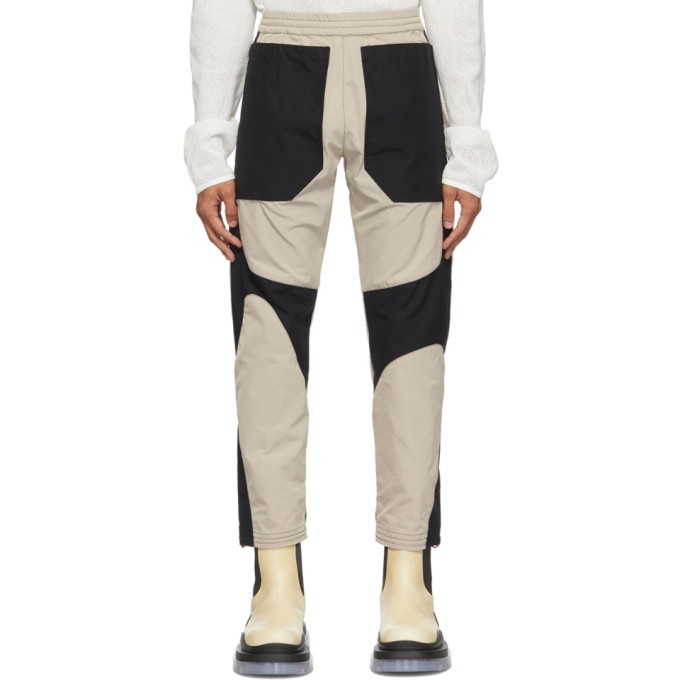 Photo: Arnar Mar Jonsson Black and Beige Overdyed Patch Track Trousers
