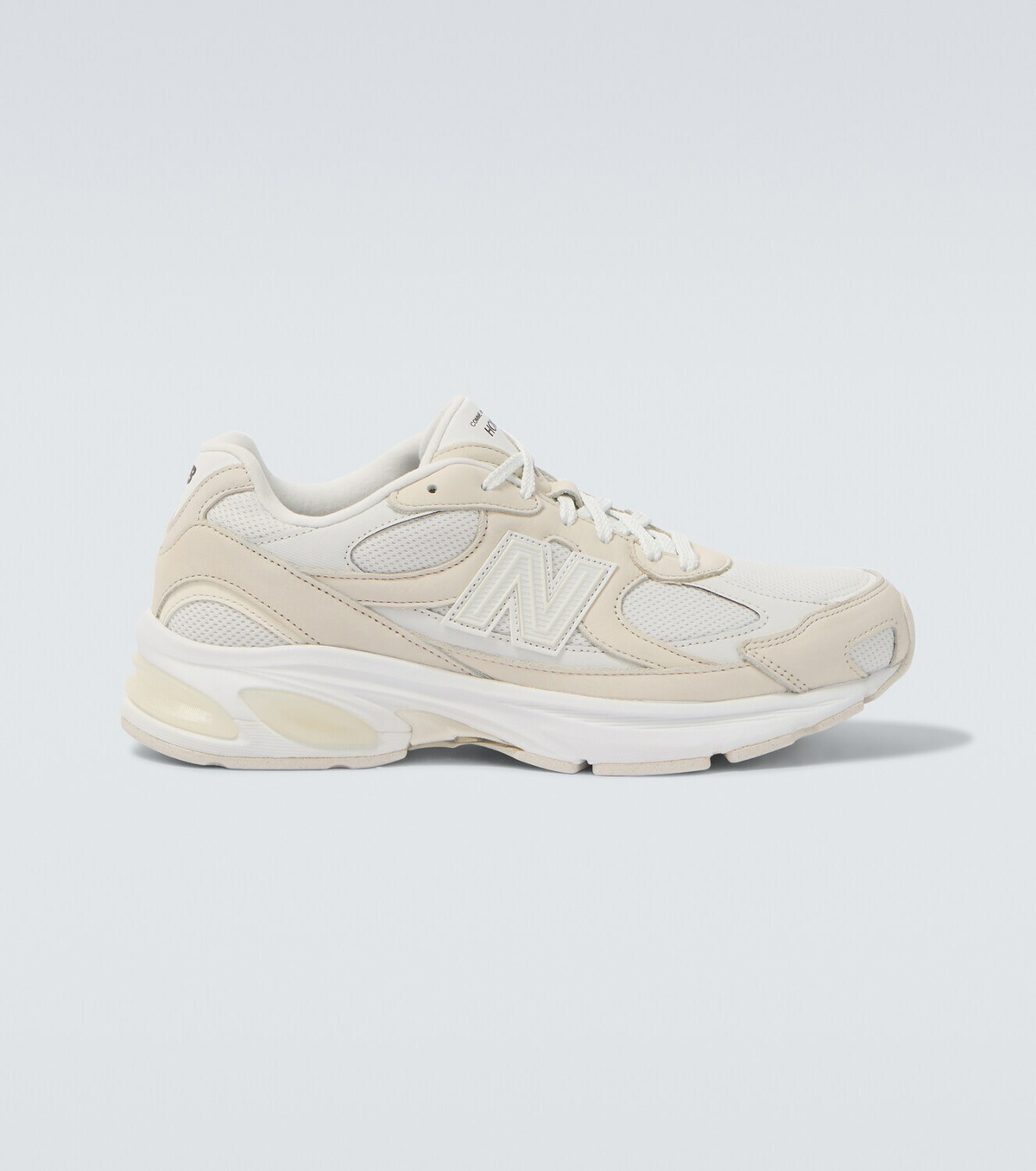 Comme des Garçons Homme x New Balance 2010 leather-trimmed sneakers