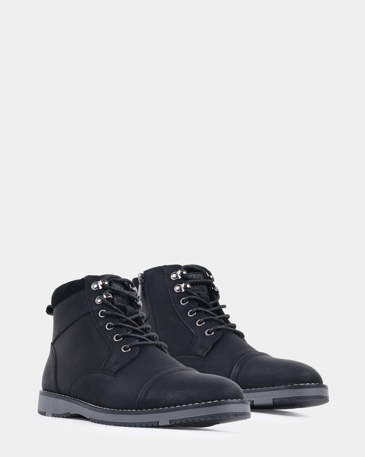 Steve Madden Mentor Boots in Black