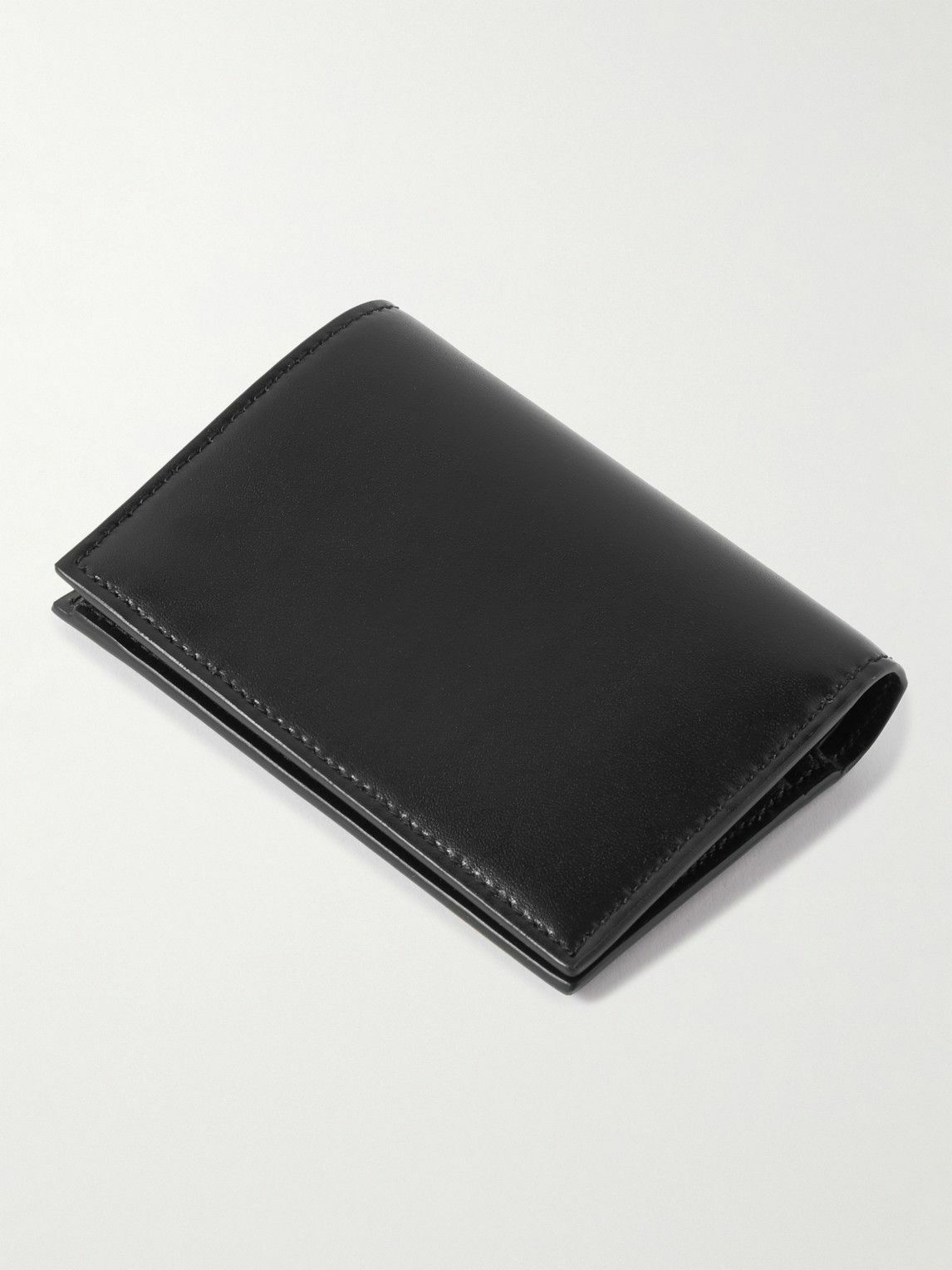 Quilted leather wallet with metal Cassandre logo