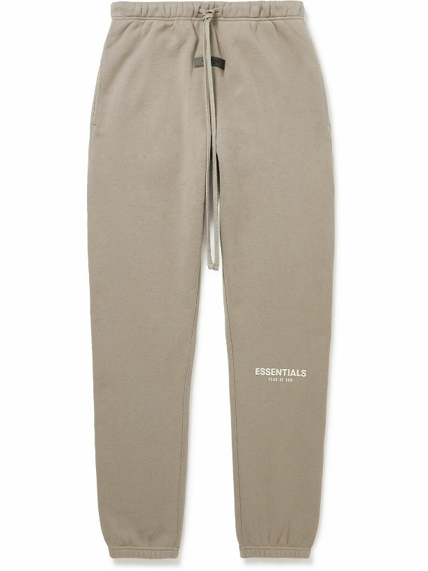 Photo: FEAR OF GOD ESSENTIALS - Slim-Fit Tapered Logo-Flocked Cotton-Blend Jersey Sweatpants - Brown