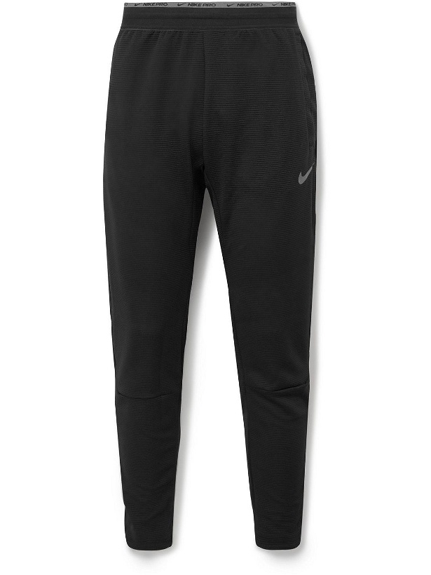 Photo: Nike Training - Pro Tapered Ribbed Dri-FIT Fleece Sweatpants - Black