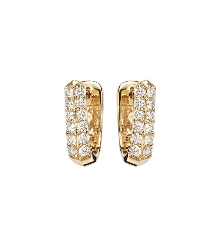 Photo: Stone and Strand Knife Edge Wide 14kt gold huggie earrings with diamonds