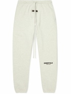 FEAR OF GOD ESSENTIALS - Tapered Logo-Flocked Cotton-Blend Jersey Sweatpants - Gray