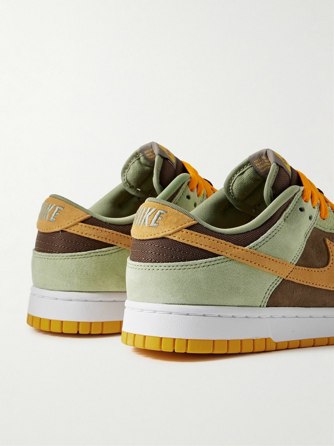olive green and orange nike shoes