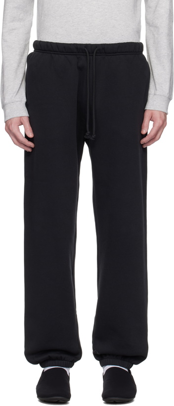 Photo: SKIMS Black Fleece Lounge Relaxed Sweatpants