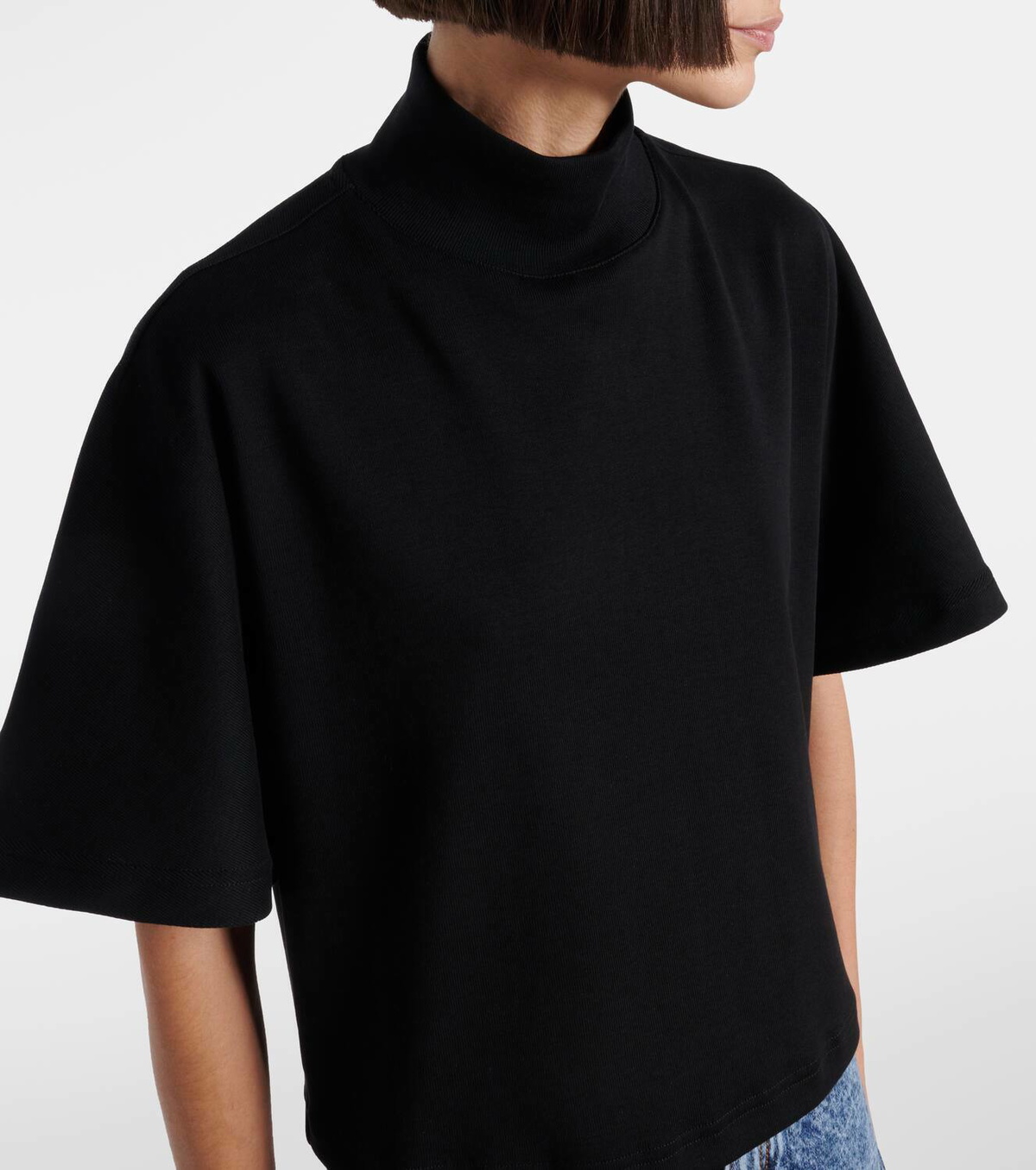 【ALAIA】 High-neck cotton jersey T-shirt High-neck cotton jersey T-shirt in white - Alaia | Mytheresa