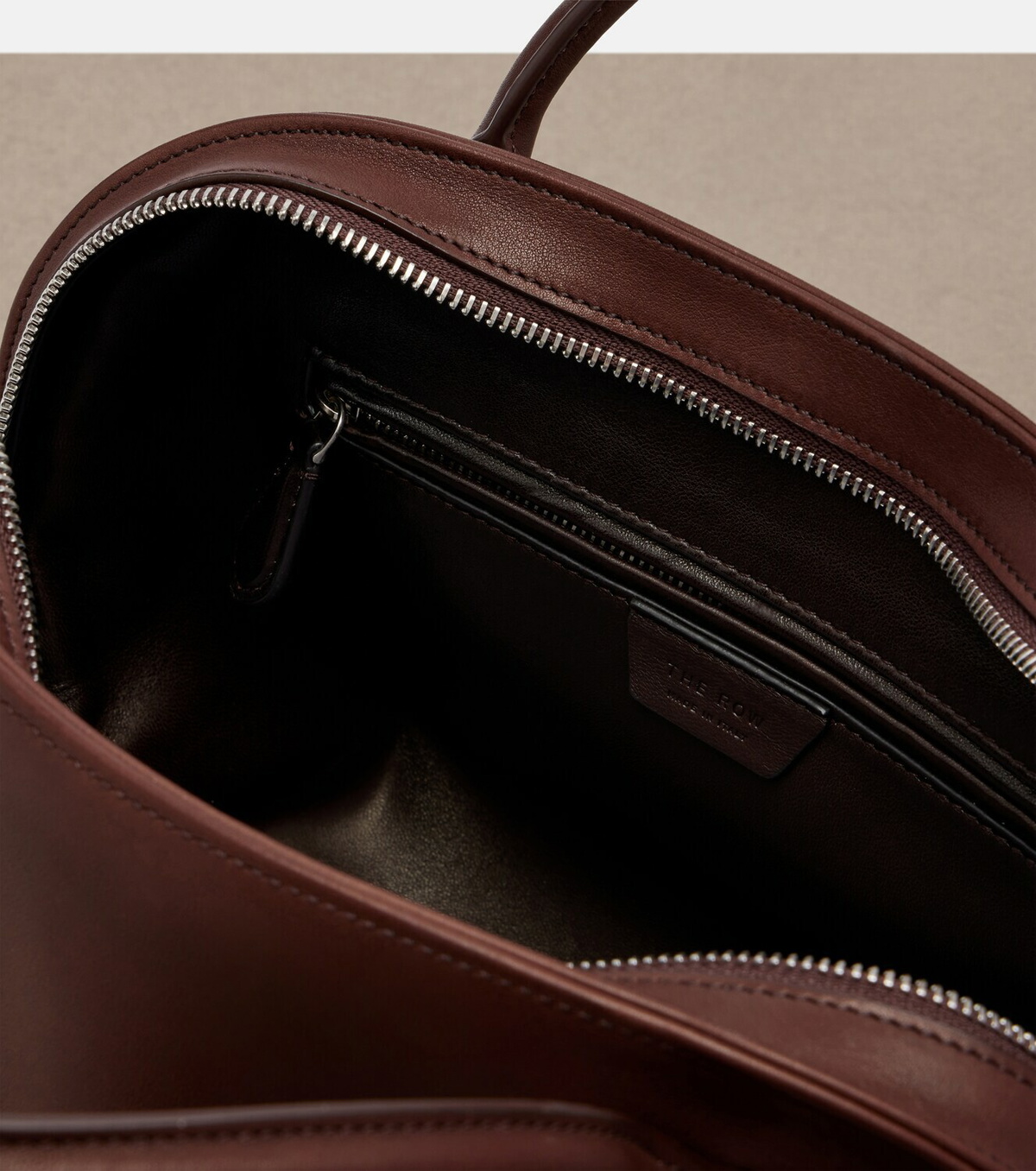 The Row Agnes 12 leather top-handle bag