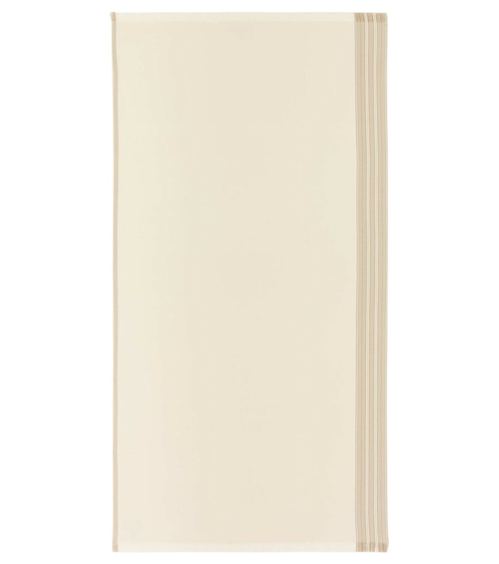 Photo: Loro Piana Suitcase striped beach towel