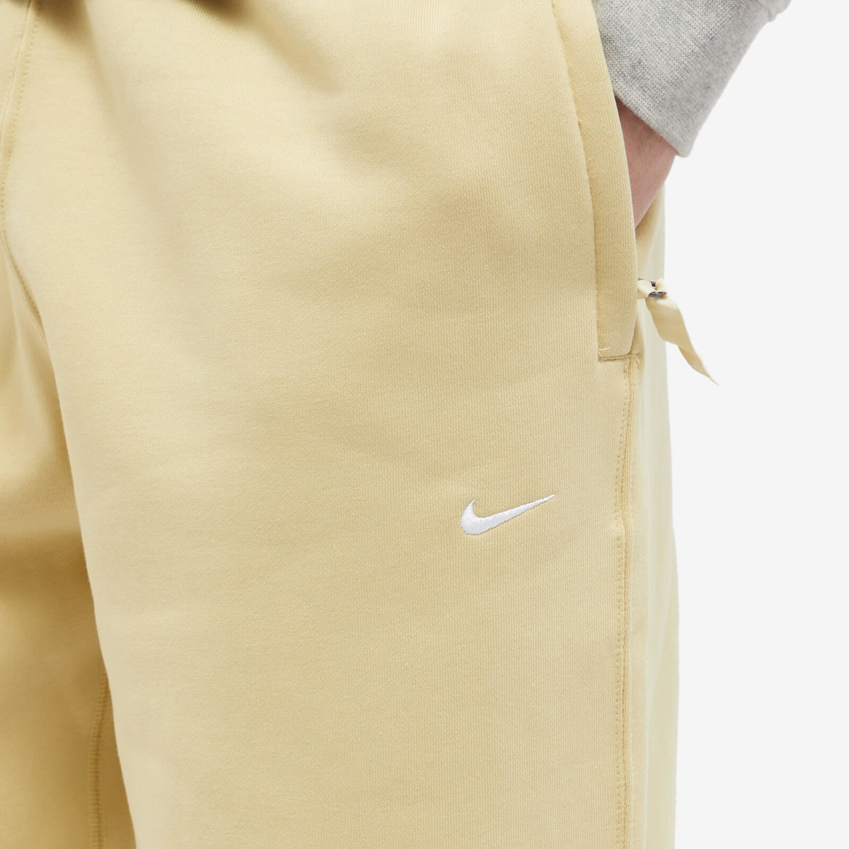 Nike Men's Solo Swoosh Fleece Pant in Team Gold/White Nike