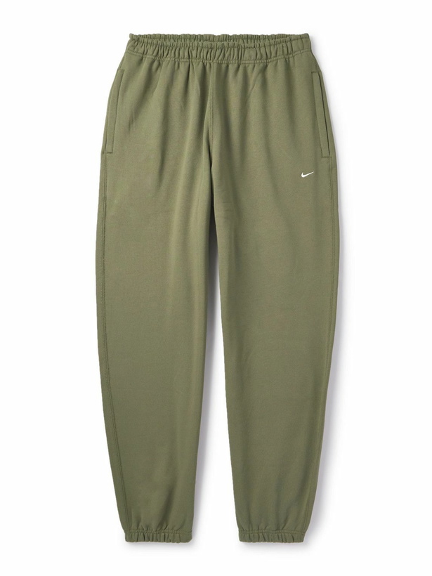 Photo: Nike - Solo Swoosh Tapered Logo-Embroidered Cotton-Blend Jersey Sweatpants - Green