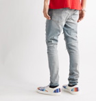 AMIRI - Thrasher Skinny-Fit Distressed Panelled Stretch-Denim Jeans - Blue