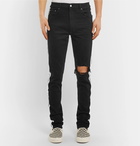 AMIRI - Track Skinny-Fit Striped Distressed Stretch-Denim Jeans - Men - Black