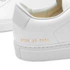 Woman by Common Projects Women's Retro Gloss Trainers Sneakers in White