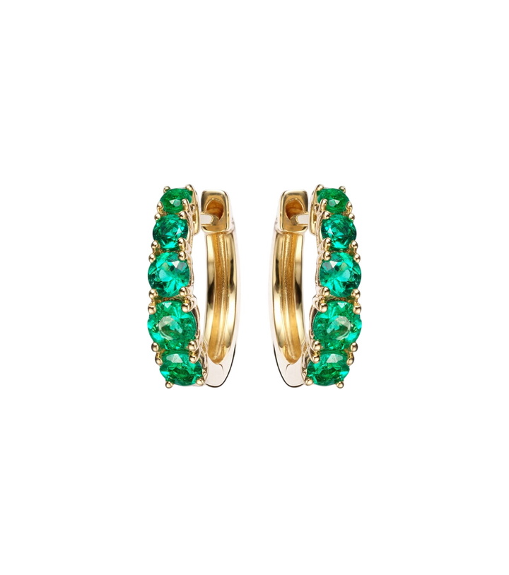 Photo: Anita Ko Graduated 18kt gold huggie earrings with emeralds