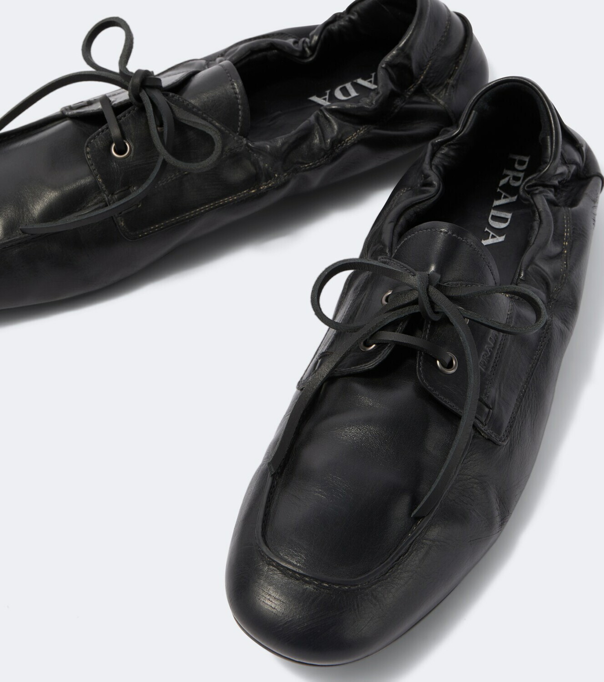 Prada Shuffle leather loafers