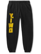 Y,IWO - Tapered Logo-Print Cotton-Jersey Sweatpants - Black