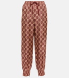 Gucci - GG Supreme printed silk sweatpants