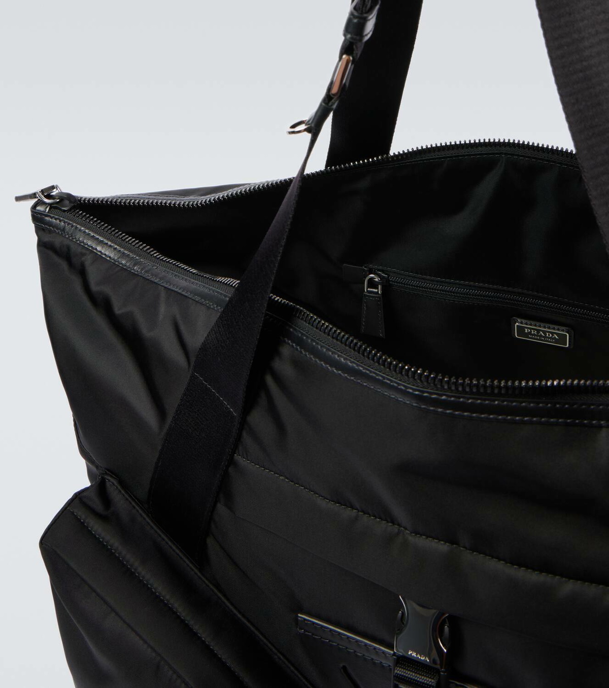 Prada Re-Nylon leather-trimmed duffel bag