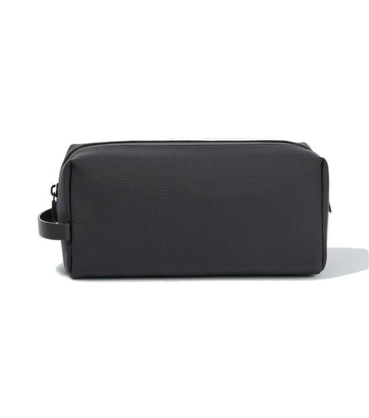 Photo: The Row Clovis leather-trimmed toiletry pouch