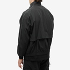 Nike Men's Solo Swoosh Woven Track Jacket in Black/White