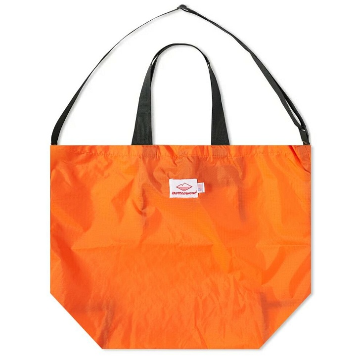 Photo: Battenwear Men's Packable Tote Bag in Orange/Black