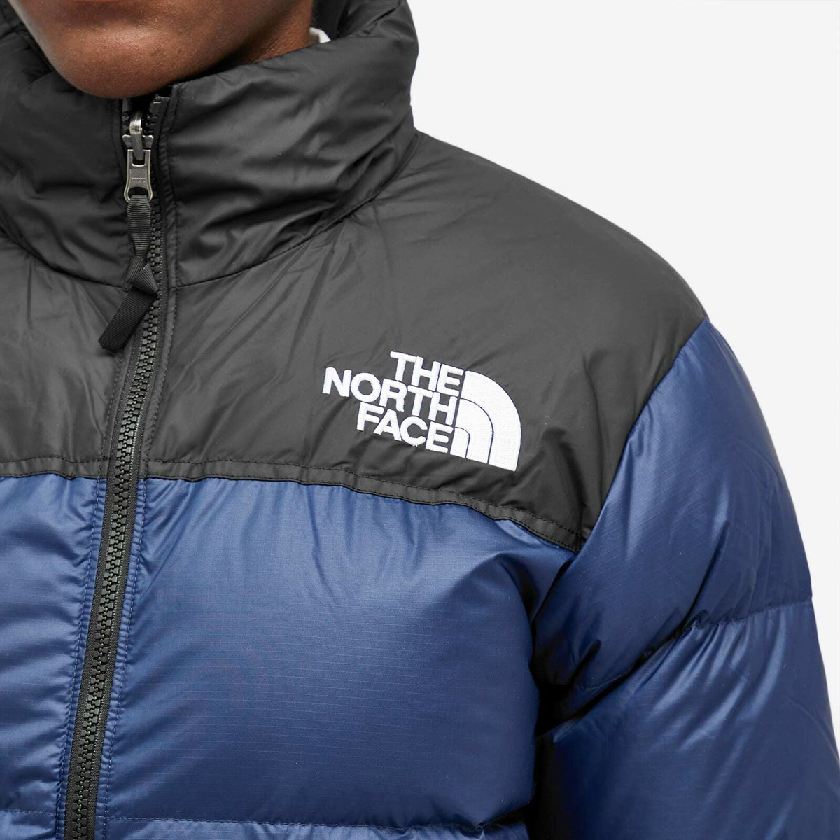 the-north-face-women-s-1997-retro-nuptse-jacket-in-blue-the-north-face