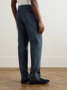 Stòffa - Tapered Pleated Cotton-Canvas Trousers - Blue