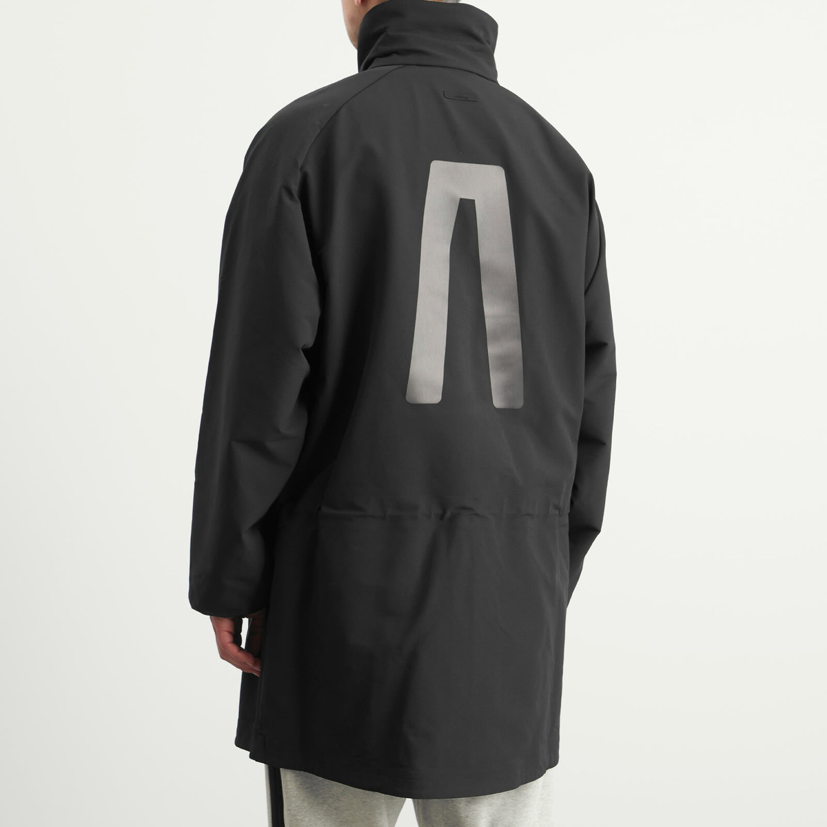 Adidas x FOG adidas x Fear Of God Athletics Brushback Woven Storm Jacket in Black