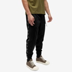 Mastermind Japan Men's Skull Tape Track Pants in Black