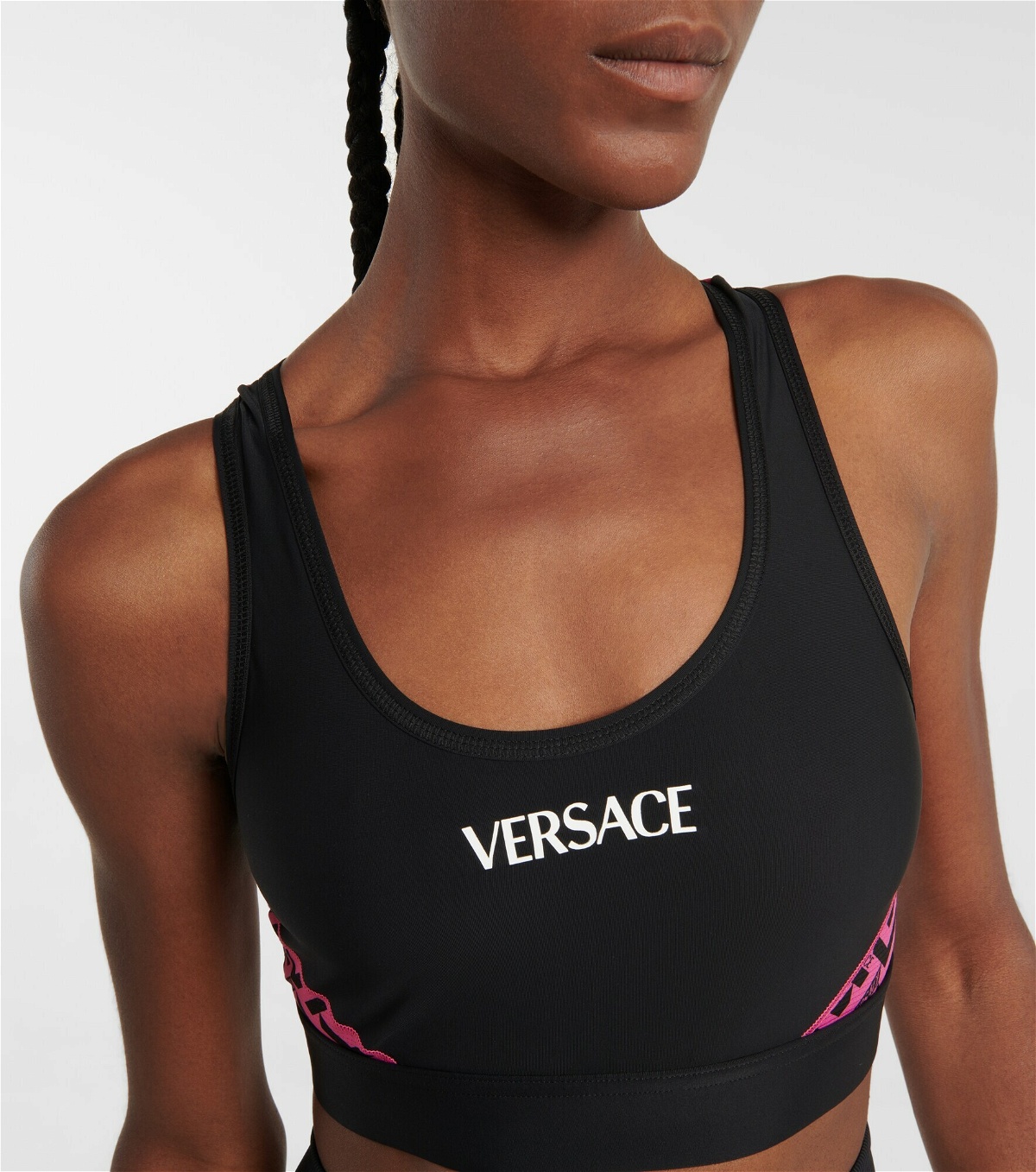 Greca cutout sports bra in black - Versace