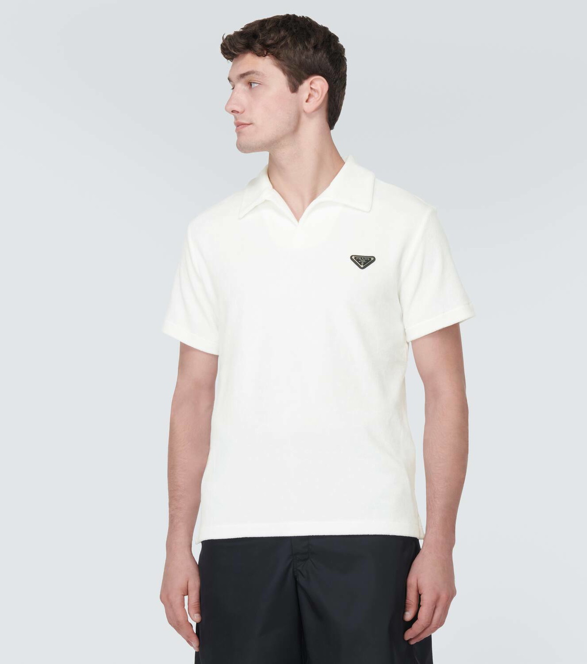 トップス PRADA logo plate polo shirt Logo cotton polo shirt in black - Prada | Mytheresa