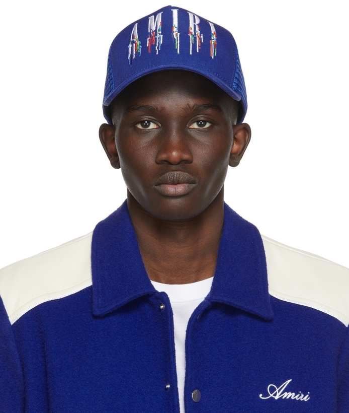 Photo: AMIRI Blue Paint Drip Core Logo Trucker Cap