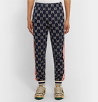 Gucci - Tapered Striped Logo-Intarsia Cotton Track Pants - Navy