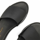 Woman by Common Projects Women's Leather Slides in Black
