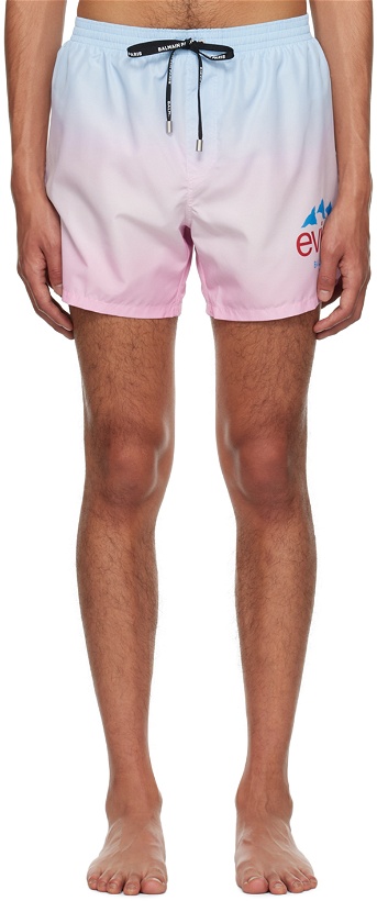 Photo: Balmain Pink Evian Edition Swim Shorts