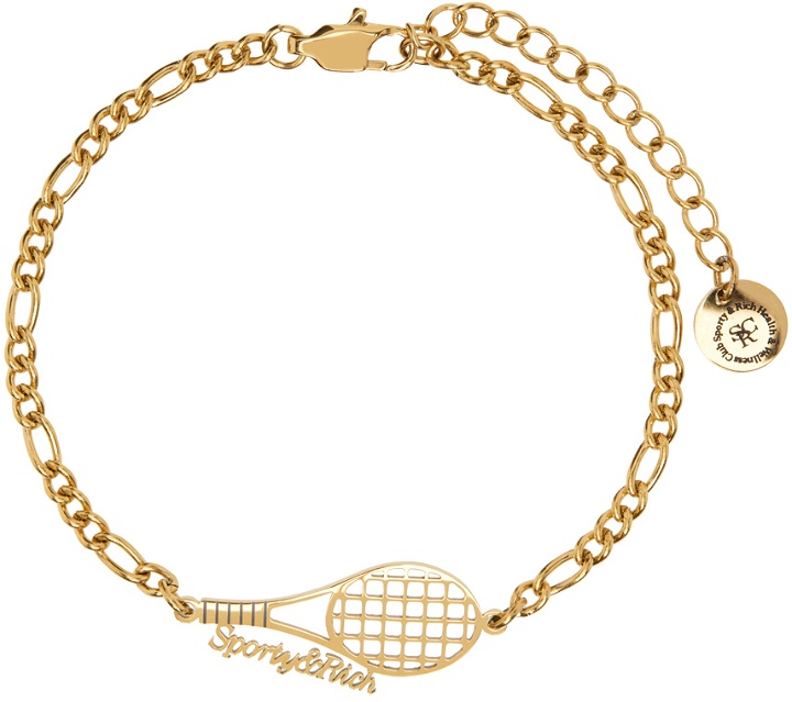 Photo: Sporty & Rich Gold Tennis Bracelet