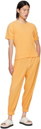 HOMME PLISSÉ ISSEY MIYAKE Orange Monthly Color June Trousers