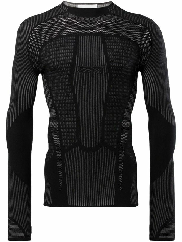 Photo: Reebok LTD Black Vector-Appliqué Mesh Top