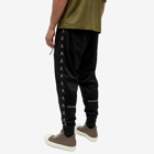 Mastermind Japan Men's Skull Tape Track Pants in Black