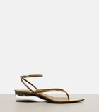 Alaïa Invisible patent leather wedge thong sandals