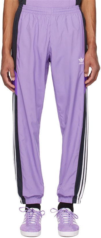 Photo: adidas Originals Purple & Black Rekive Track Pants