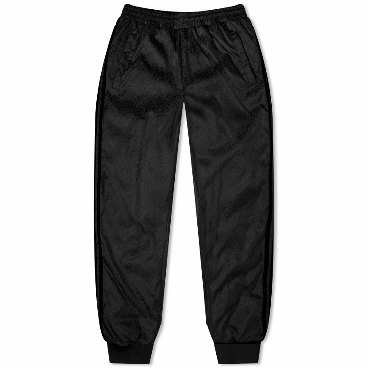 Photo: Moncler Men's x adidas Originals Reversible Down Trousers in Black