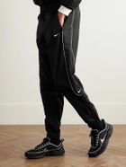 Nike - Solo Swoosh Logo-Embroidered Nylon Track Pants - Black