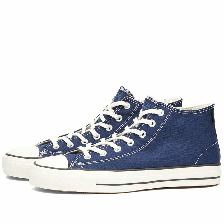 Photo: Converse Men's Skate Chuck Taylor All Star Pro Mid Sneakers in Midnight Navy/Black