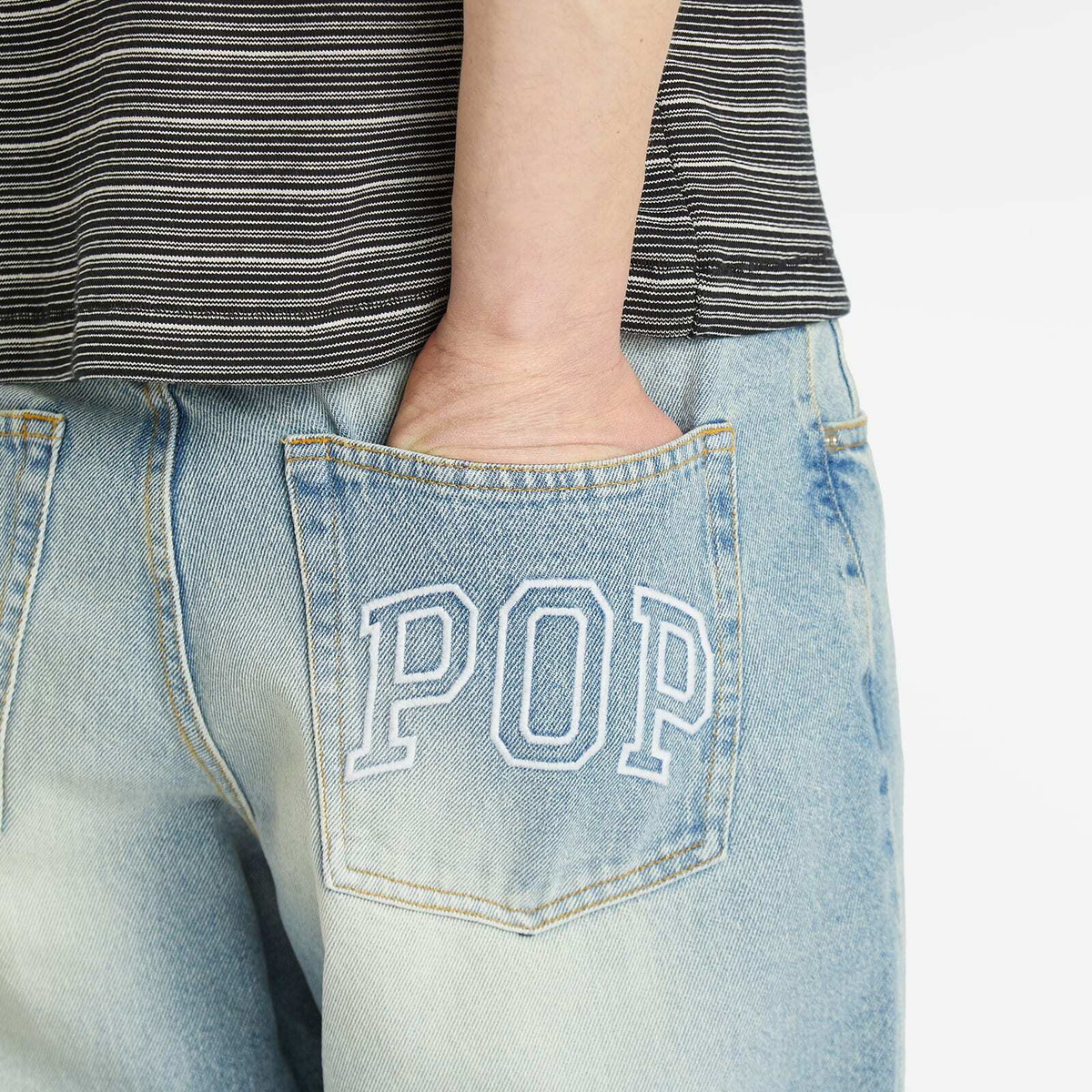 Pop Trading Company Men's Arch Pocket Loose Denim Jeans in Washed Denim