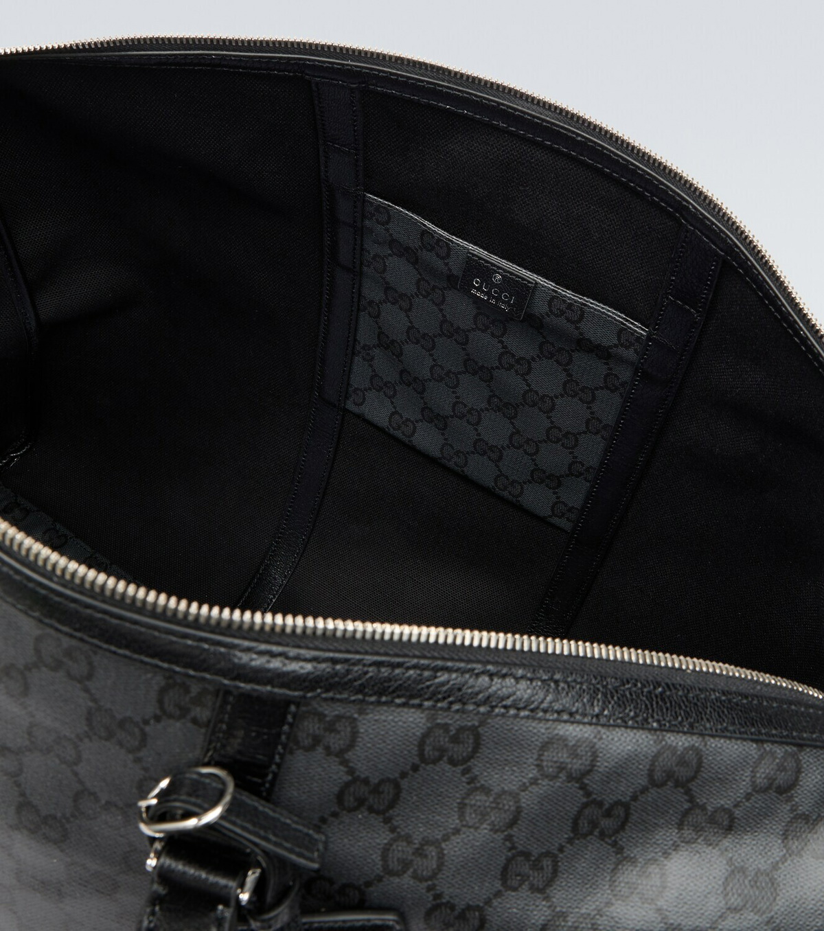 Gucci GG canvas leather-trimmed duffel bag