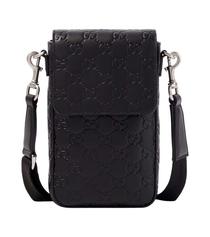 Photo: Gucci GG Emblem debossed leather phone pouch