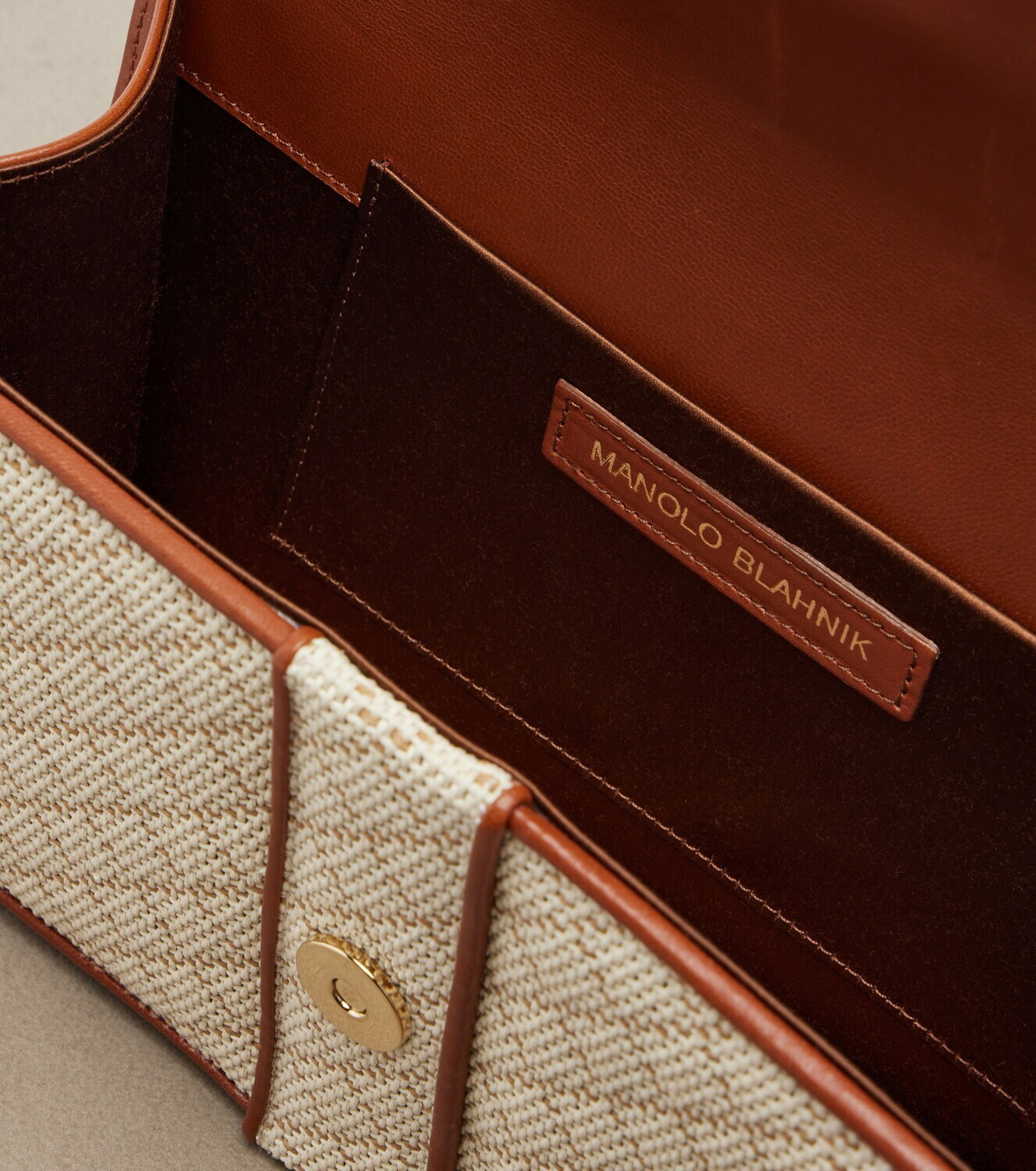 Manolo Blahnik Maycap raffia-effect clutch