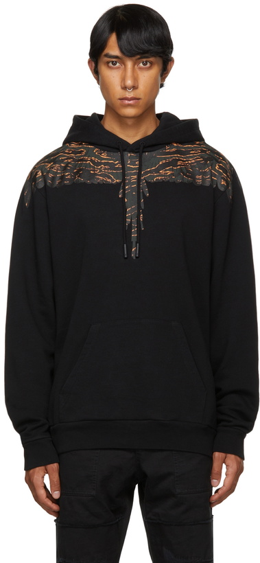 Photo: Marcelo Burlon County of Milan Black & Orange Camo Wings Hoodie